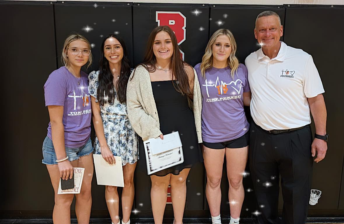 Borden students accepting scholarship.